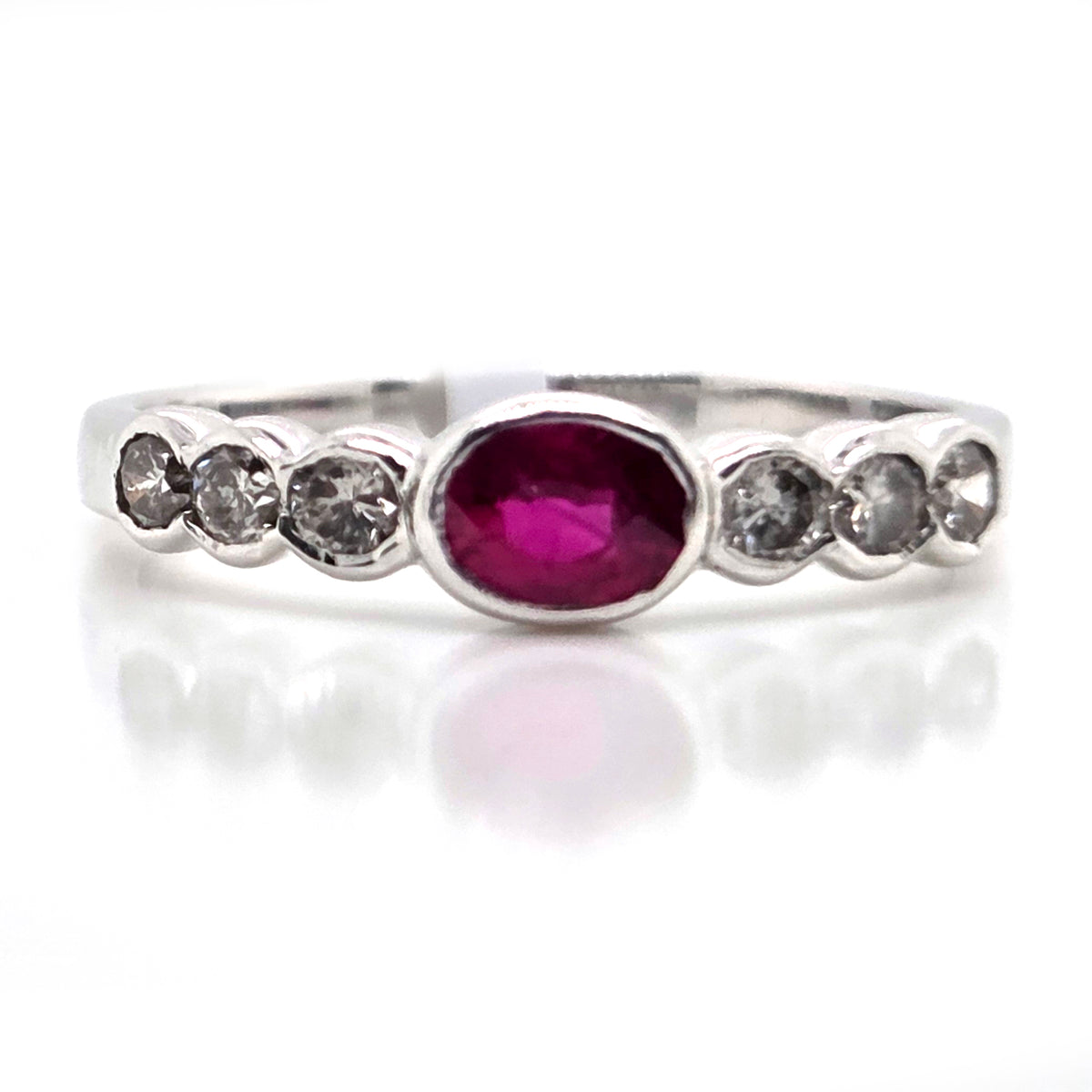 Oval Ruby and Diamond Seven Stone Ring