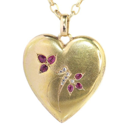 Victorian gold heart shaped locket set with diamonds and rubies