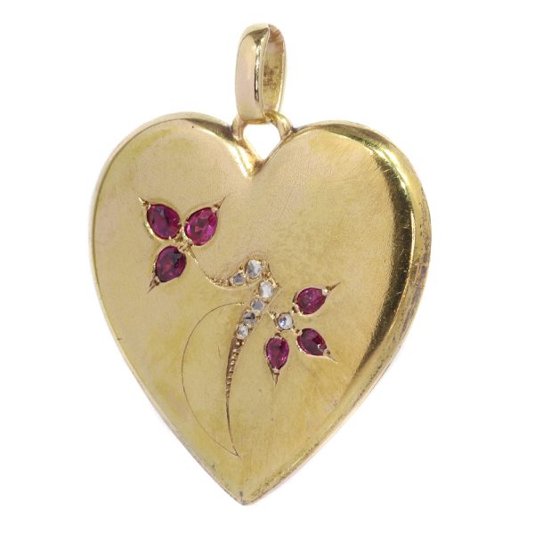 Victorian gold heart shaped locket set with diamonds and rubies