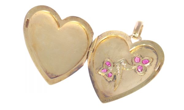 Victorian gold heart shaped locket set with diamonds and rubies