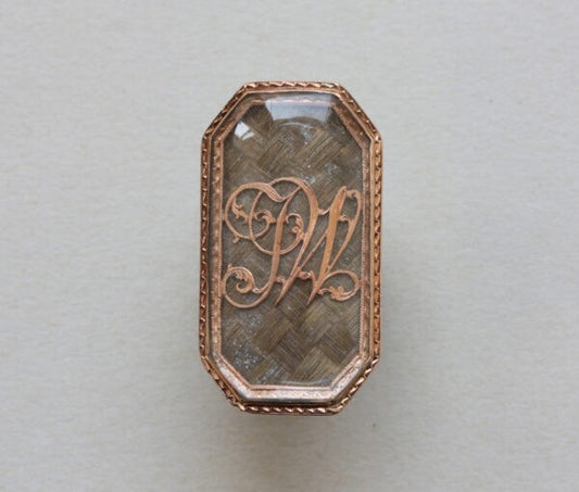 18th Century Antique Octagonal Rose Gold Mourning Ring; with large octagonal panel containing woven hair and bearing the initials JW in gold
