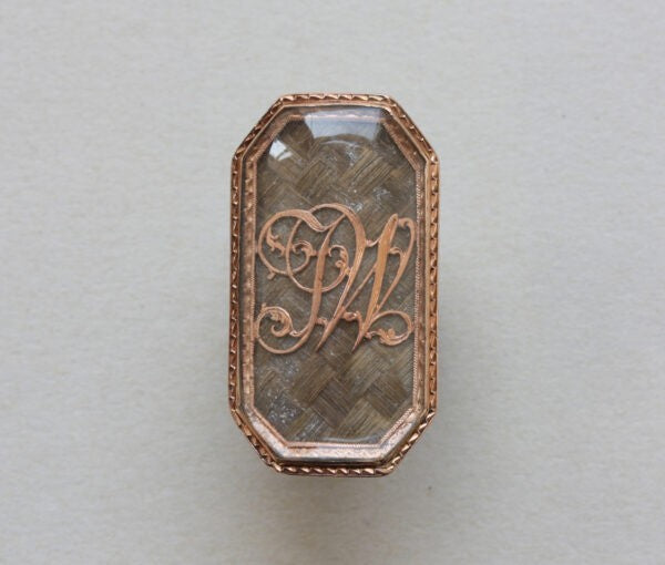 18th Century Antique Octagonal Rose Gold Mourning Ring; with large octagonal panel containing woven hair and bearing the initials JW in gold