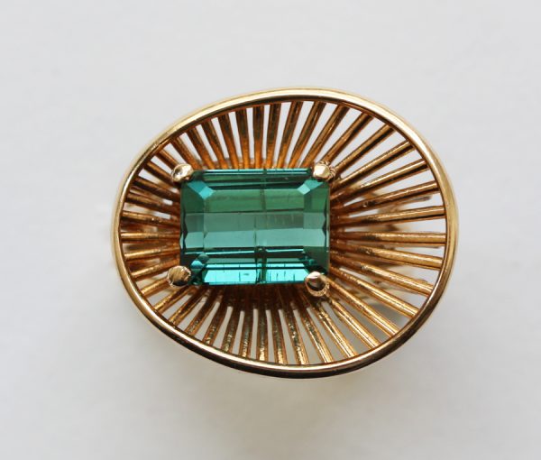 Vintage Emerald Cut Tourmaline and Gold Asymmetrical Ring; 14ct yellow gold wire work ring, set with a green emerald-cut tourmaline. Circa 1950