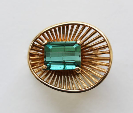 Vintage Emerald Cut Tourmaline and Gold Asymmetrical Ring; 14ct yellow gold wire work ring, set with a green emerald-cut tourmaline. Circa 1950