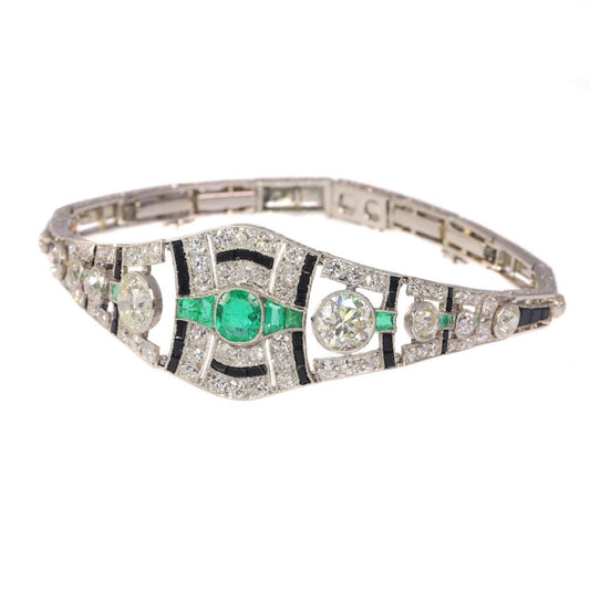 Vintage Art Deco 6.93 Carat Old Cut Diamond, Onyx And Emerald Bracelet In Platinum