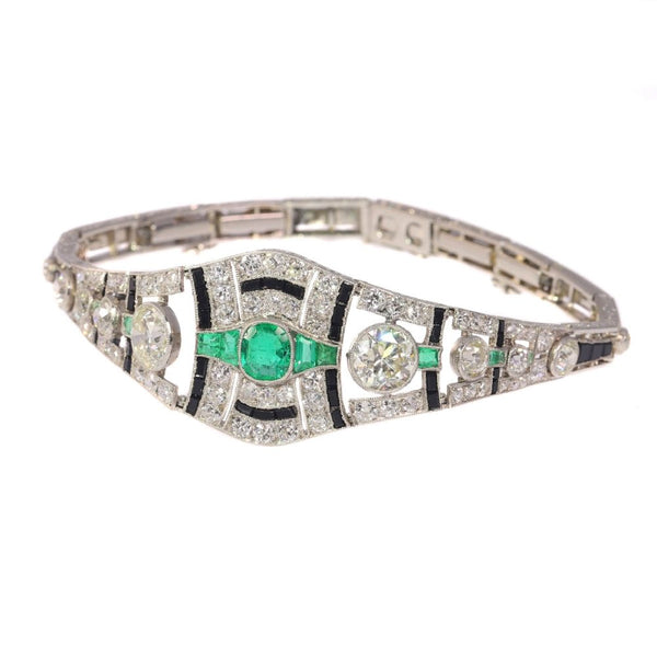 Vintage Art Deco 6.93 Carat Old Cut Diamond, Onyx And Emerald Bracelet In Platinum