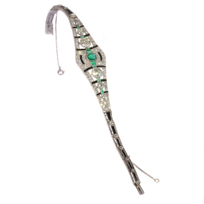 Vintage Art Deco 6.93 Carat Old Cut Diamond, Onyx And Emerald Bracelet In Platinum
