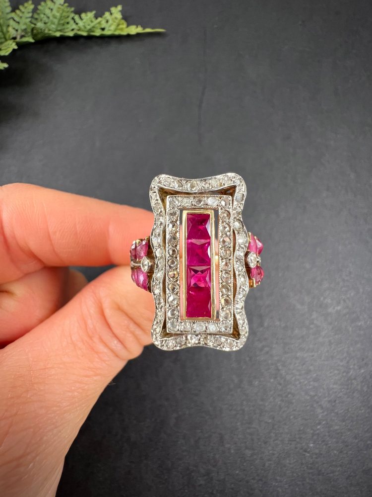 Edwardian Antique Ruby and Diamond Rectangular Cluster Tablet Plaque Ring, Central row of calibre rubies surrounded by rectangular halo of diamonds in 18ct gold