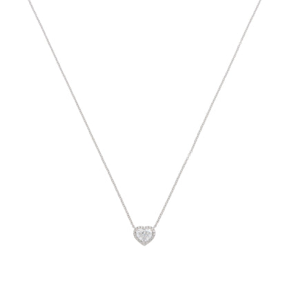 A heart shaped diamond cluster pendant on a white gold chain, on a white background
