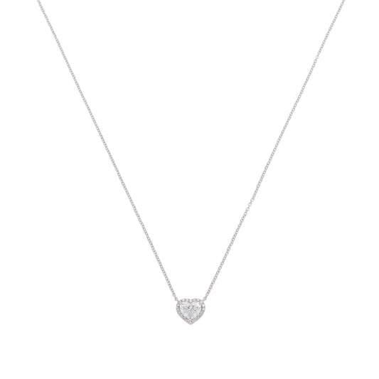 A heart shaped diamond cluster pendant on a white gold chain, on a white background