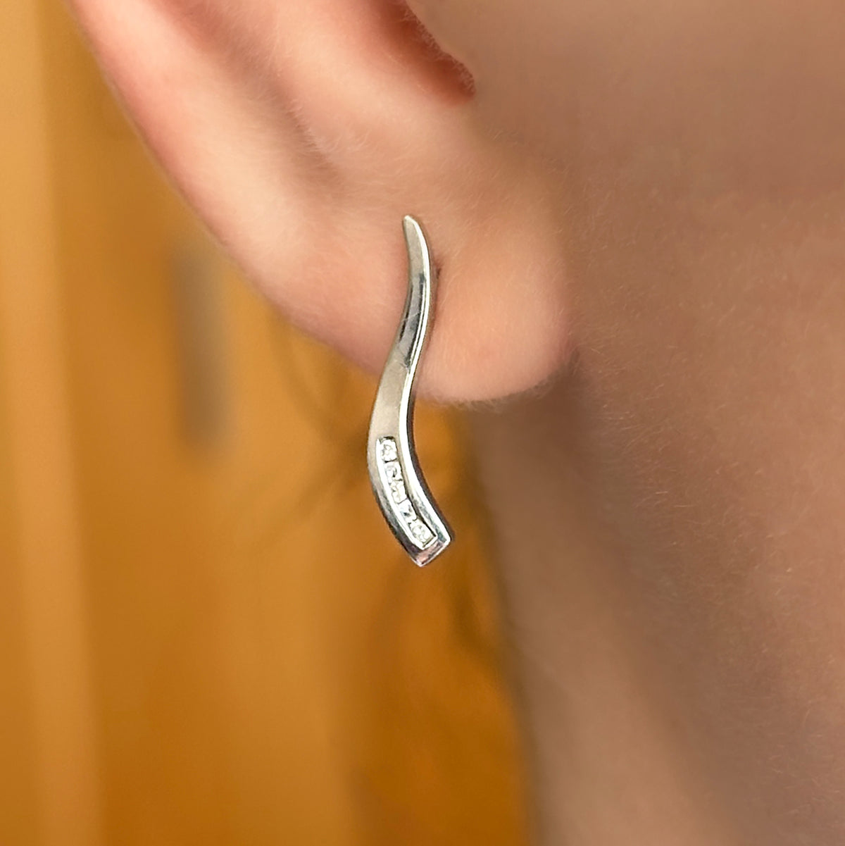 9ct White Gold diamond wave drop earrings