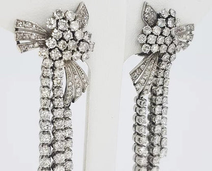 Diamond and Platinum Drop Earrings; 5.00 carat total; brilliant-cut diamond set clusters and drops, a decadent piece, in platinum, estimated 5.00 carats.