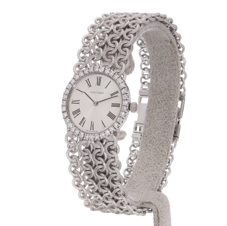 Ladies Vintage Longines 18ct White Gold Watch with Diamond Bezel on a woven design 18ct white gold strap. Circa 1970s
