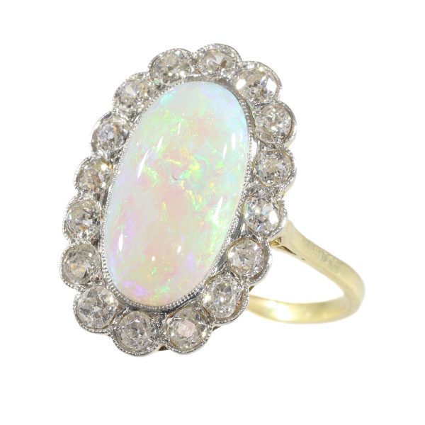 Antique Art Deco cabochon opal and diamond engagement ring