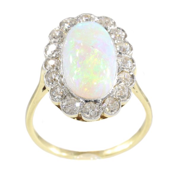 Antique Art Deco cabochon opal and diamond engagement ring