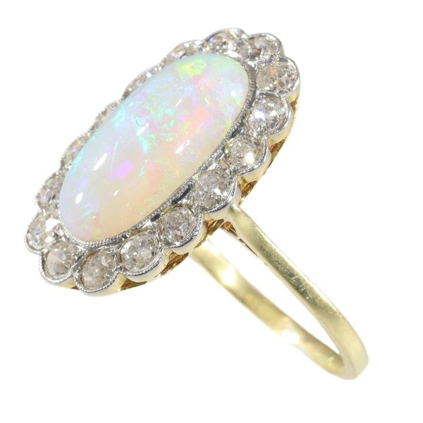 Antique Art Deco cabochon opal and diamond engagement ring
