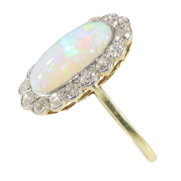Antique Art Deco cabochon opal and diamond engagement ring