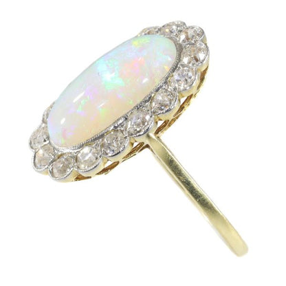 Antique Art Deco cabochon opal and diamond engagement ring