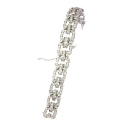 Vintage Art Deco Style Diamond Bracelet in Platinum; open square cushion-shaped links encrusted with 227 round brilliant-cut diamonds totalling 10.06 carats, Circa 1950