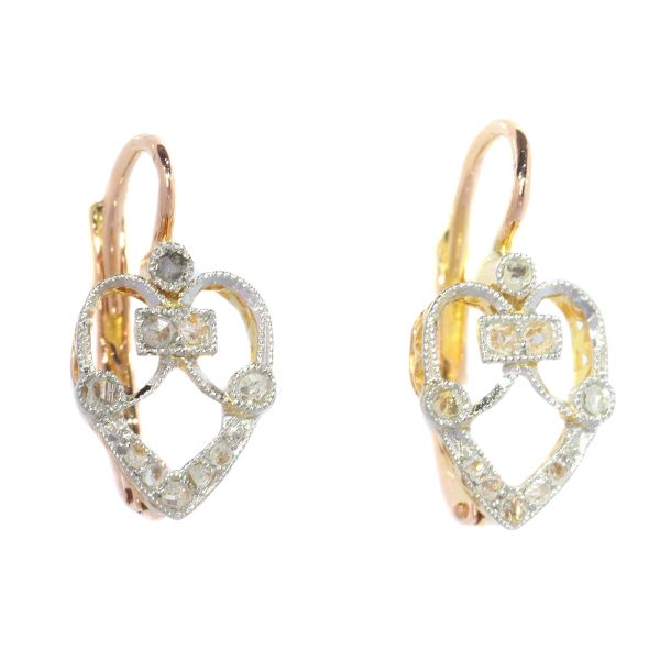 Belle Epoque Rose Cut Diamond Heart Drop Earrings; an openwork heart design set with twenty rose-cut diamonds, on 18ct rose gold, Circa 1900