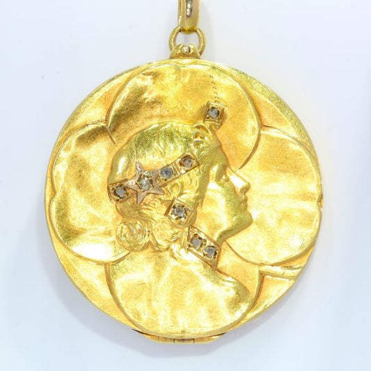 Art Nouveau Four Leaf Clover Locket Pendant with Rose Cut Diamonds; four-leaf clover design crafted from 18ct yellow gold, accented with the profile of a lady's head decorated with eight rose-cut diamonds, Circa 1900