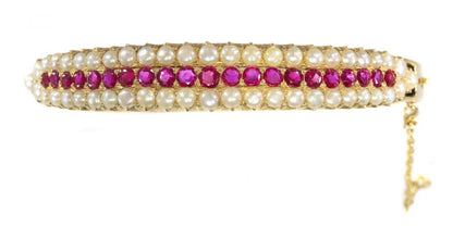 Antique Victorian 2.20ct Ruby and Pearl Bangle Bracelet in 14ct Gold, late 19th century Circa 1880
