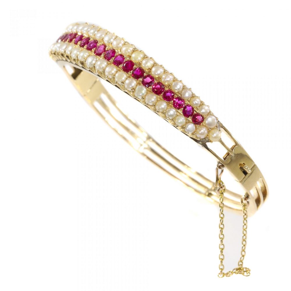Antique Victorian 2.20ct Ruby and Pearl Bangle Bracelet in 14ct Gold, late 19th century Circa 1880