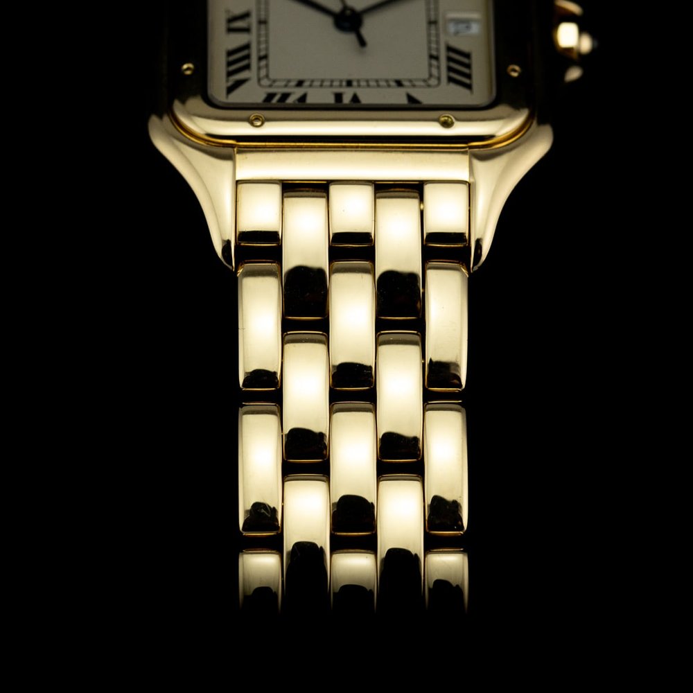 Vintage Cartier Panthere 1060 27mm 18ct Yellow Gold Watch with red suede Cartier pouch and Cartier service papers dated 2005, Circa 1990s