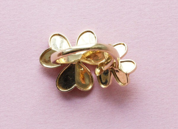 Van Cleef and Arpels 18ct Yellow Gold Frivole Flower Ring; comprising two diamond set flowers, Signed Van Cleef en Arpels, Numbered E271013