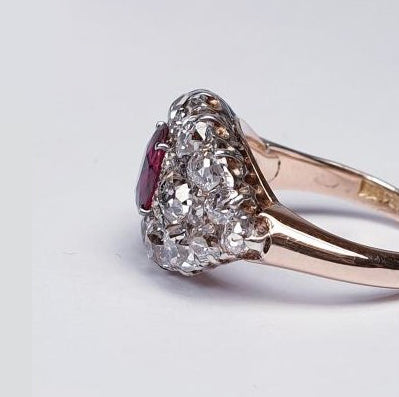 Victorian Antique 1.25ct Siamese Ruby and 3ct Old Mine Cut Diamond Domed Navette Cluster Dress Ring in 18ct yellow gold. Circa 1890