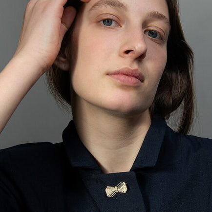 Vintage French Gold Bow Brooch with Onyx and Diamonds By Pery & Fils