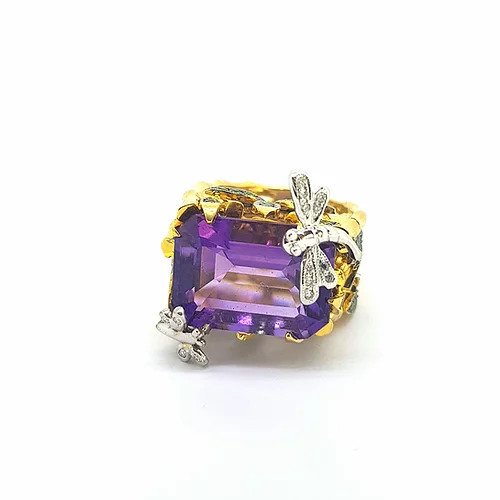 Contemporary Amethyst, Diamond and Green Garnet Dress Ring; central emerald-cut amethyst dressed by diamond-set dragonflies, in decorative 18ct yellow gold shank designed as tree bark and stems, green garnet-set leaves down the sides