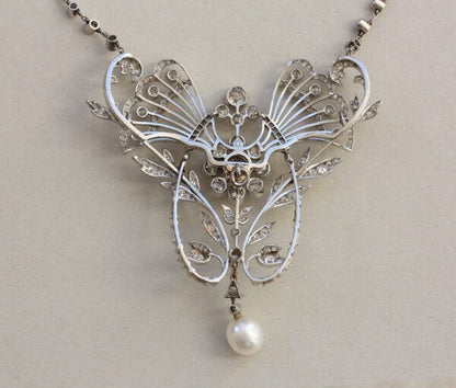 Antique Edwardian 3.7ct Old Cut Diamond, Pearl and Platinum Necklace/Brooch; with over 200 old and rose-cut diamonds totaling 3.70 carats, natural pearl drop