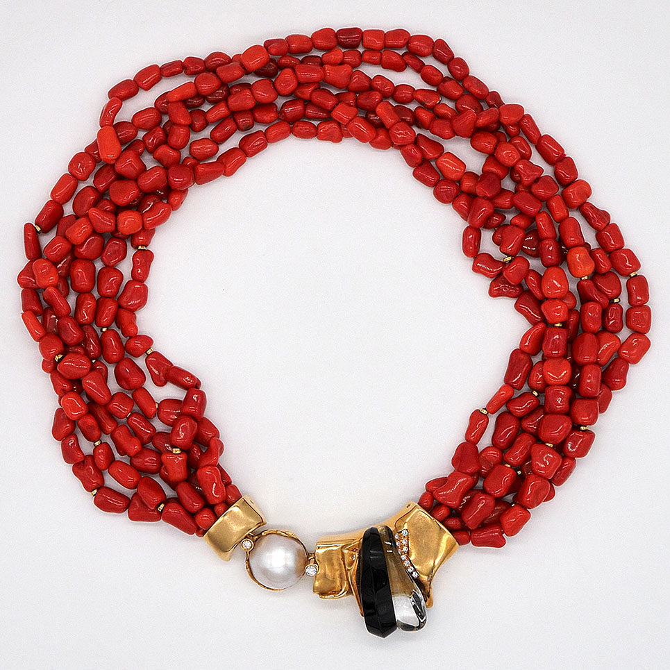 Misani Milano Natural Red Sardinia Coral Necklace, 6 intertwined strands of natural Italian Red Sardinia coral with 18ct yellow gold clasp set with diamonds, mabe pearl, black onyx and rock crystal, Circa 1980