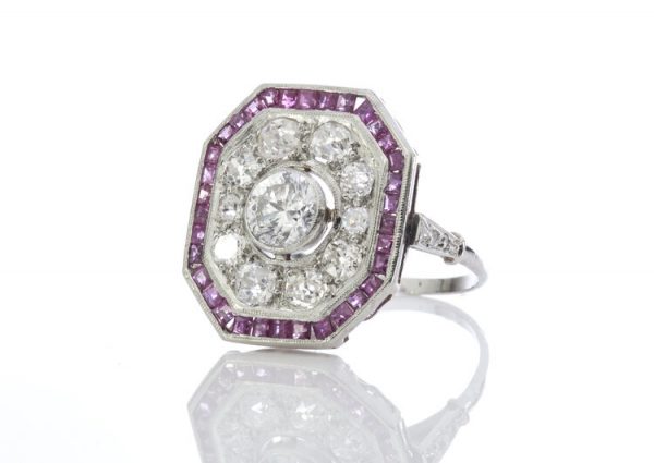 Late Art Deco Diamond, Ruby and Platinum Cluster Ring; with 1.45cts old and brilliant-cut diamonds and 0.68cts square cut rubies, Circa 1930
