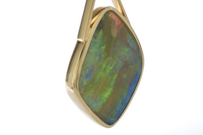 Vintage 25.00ct Opal Pendant in 18ct Yellow Gold; striking 25 carat opal of cushioned diamond shaped form, in 18ct yellow gold, Circa 1950-1970s