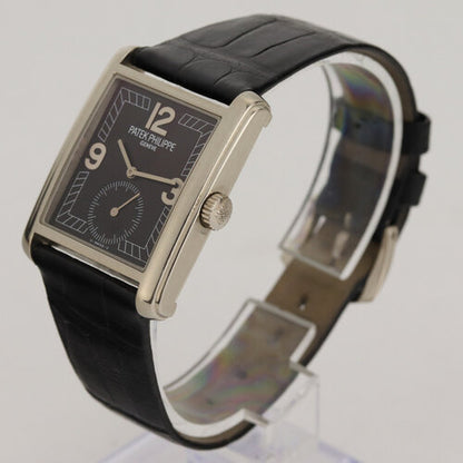 Patek Philippe 5014G Gondolo 18ct White Gold 28mm Manual, black dial, Arabic numerals, small seconds, sapphire crystal, calibre 215, Patek Philippe black leather strap with 18ct white gold pin buckle, with original paper, Circa 2006