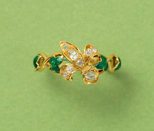 Antique Victorian Fleur de Lis Ring with Diamonds and Green Enamel; French lily fleur-de-lys set with old cut diamonds, shank accented with green enamel ivy leaves