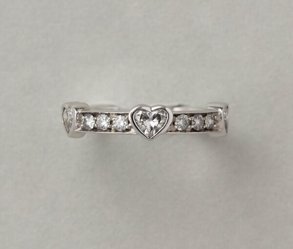 Bvlgari Diamond Heart Ring, 18ct white gold pinky ring set with brilliant cut diamonds and three heart shaped diamonds, 0.61cts H SI, Signed Bulgari