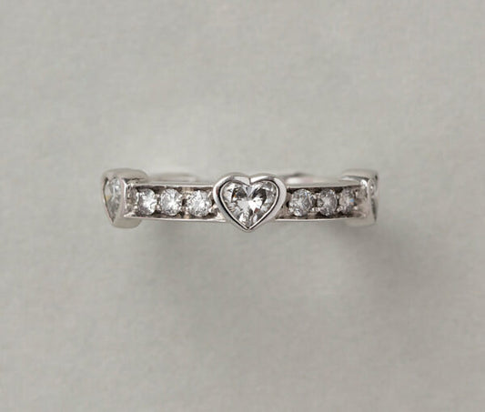 Bvlgari Diamond Heart Ring, 18ct white gold pinky ring set with brilliant cut diamonds and three heart shaped diamonds, 0.61cts H SI, Signed Bulgari