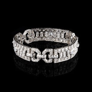 Art Deco French Diamond Bracelet; comprised of diamond set openwork panels. Made in France, Circa 1925