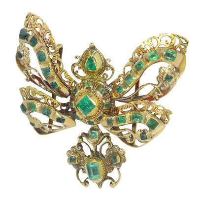 Museum Exhibited Baroque Emerald Bow Pendant In 18 Carat Yellow Gold