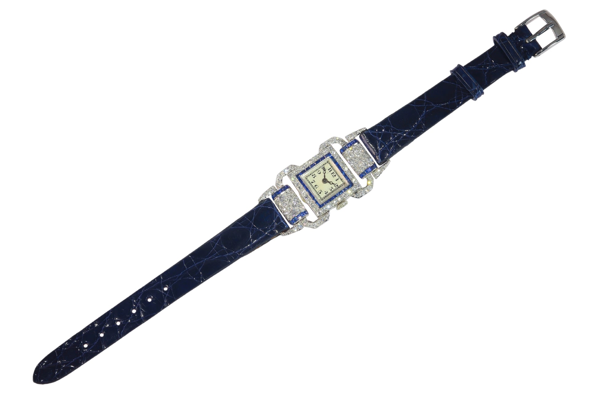 A ladies Art Deco design cocktail wristwatch set with diamonds and sapphires, on a blue leather strap