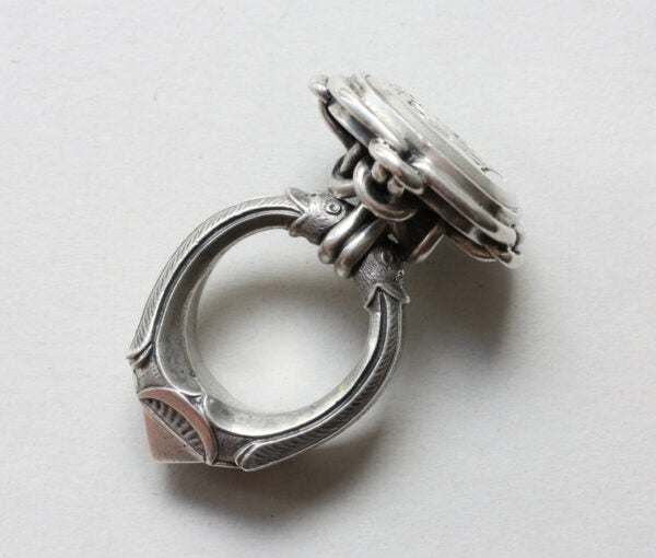 19thC French Neo Renaissance Silver Desk Seal Ring; presse papier ring, quatrefoil bezel set with octahedron diamond, animal mouths to shank, Circa 1870