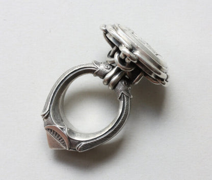 19thC French Neo Renaissance Silver Desk Seal Ring; presse papier ring, quatrefoil bezel set with octahedron diamond, animal mouths to shank, Circa 1870