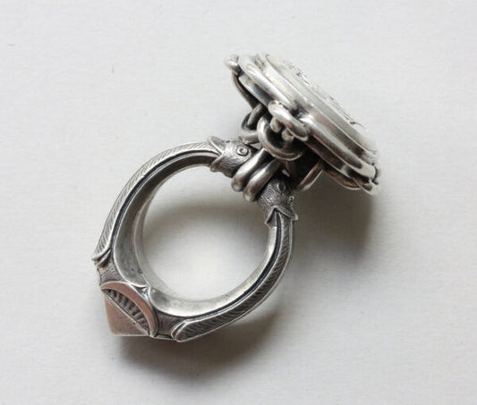 19thC French Neo Renaissance Silver Desk Seal Ring; presse papier ring, quatrefoil bezel set with octahedron diamond, animal mouths to shank, Circa 1870