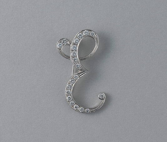 Diamond and 18ct White Gold E Brooch; depicting the initial capital E set with brilliant cut diamonds, 2.00 carat total, Could be converted into a pendant
