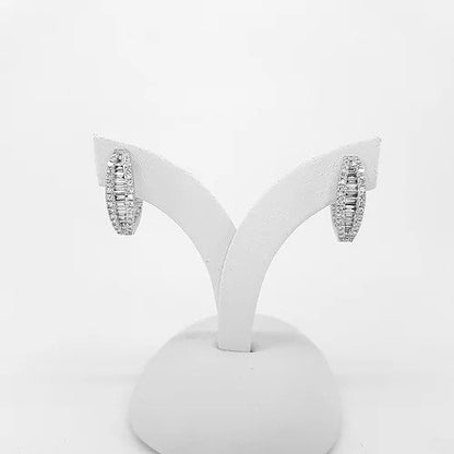 Baguette Cut Diamond Hoop Earrings; channel-set with baguette-cut diamonds with brilliant-cut diamond surround, 1.20 carat total, in 18ct white gold