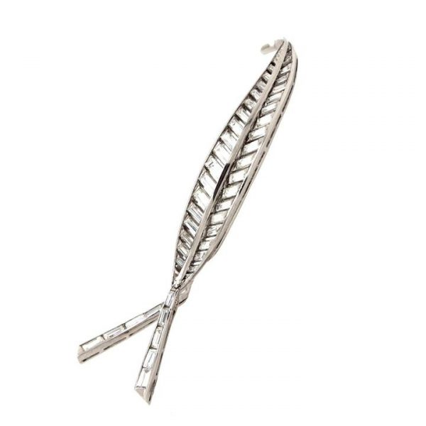 Vintage 1950s Baguette Cut Diamond and Platinum Leaf Brooch; mid 20th Century leaf-shaped spray brooch set with baguette cut diamonds, Circa 1950s