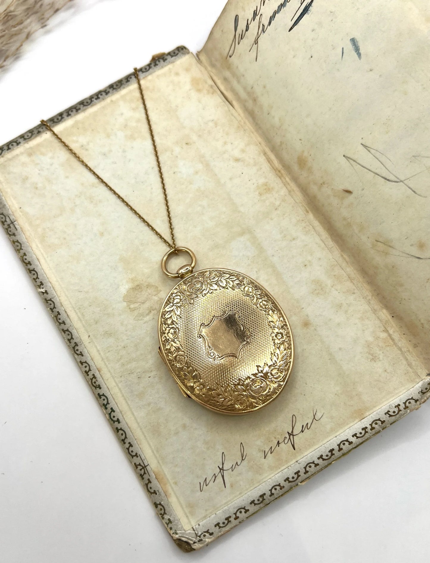 Victorian 15 Carat Yellow Gold Large Floral Engraved Oval Locket, Circa 1880
